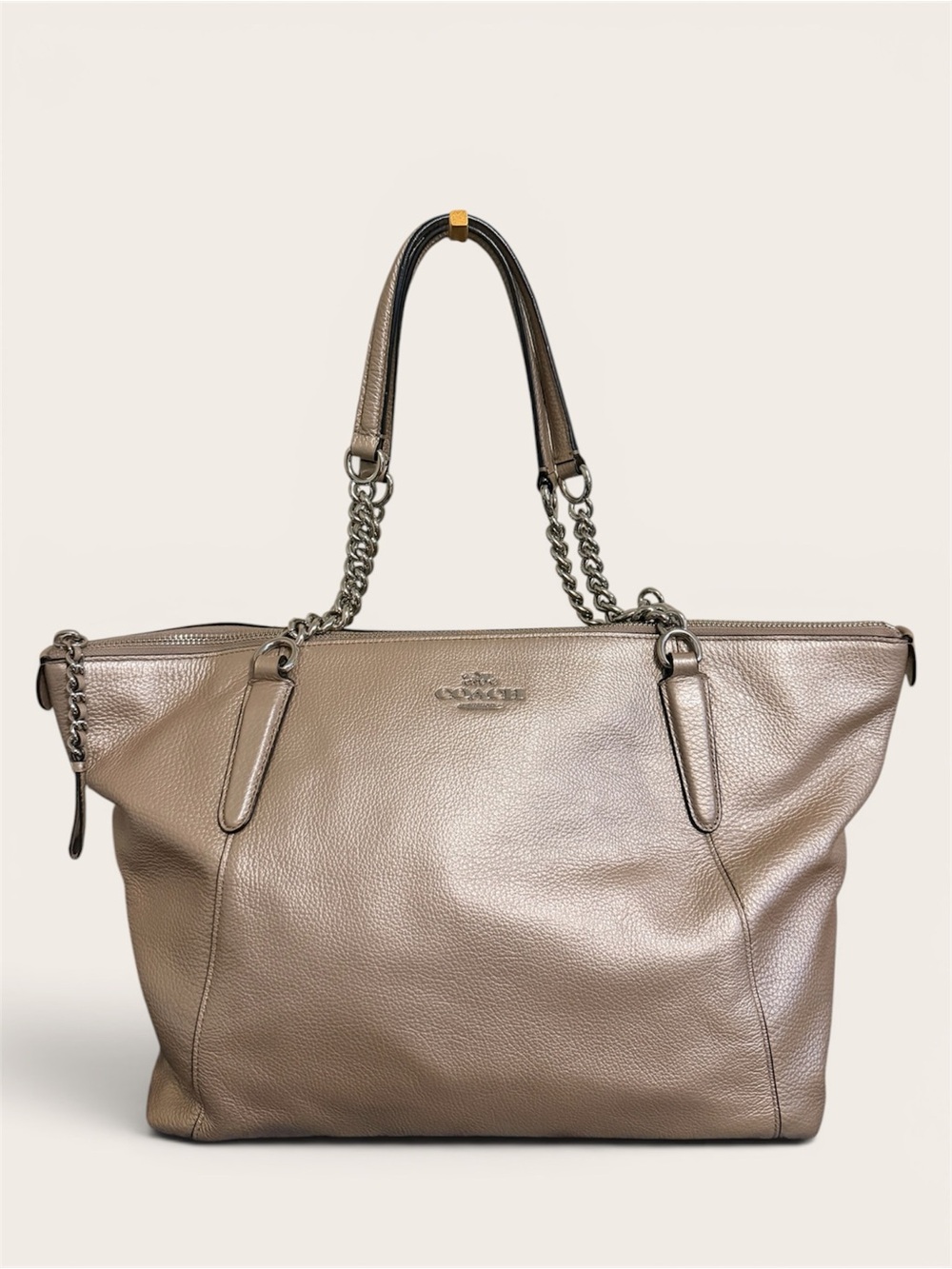 Coach Ava Chain Tote features pebbled leather and distinctive chain handles